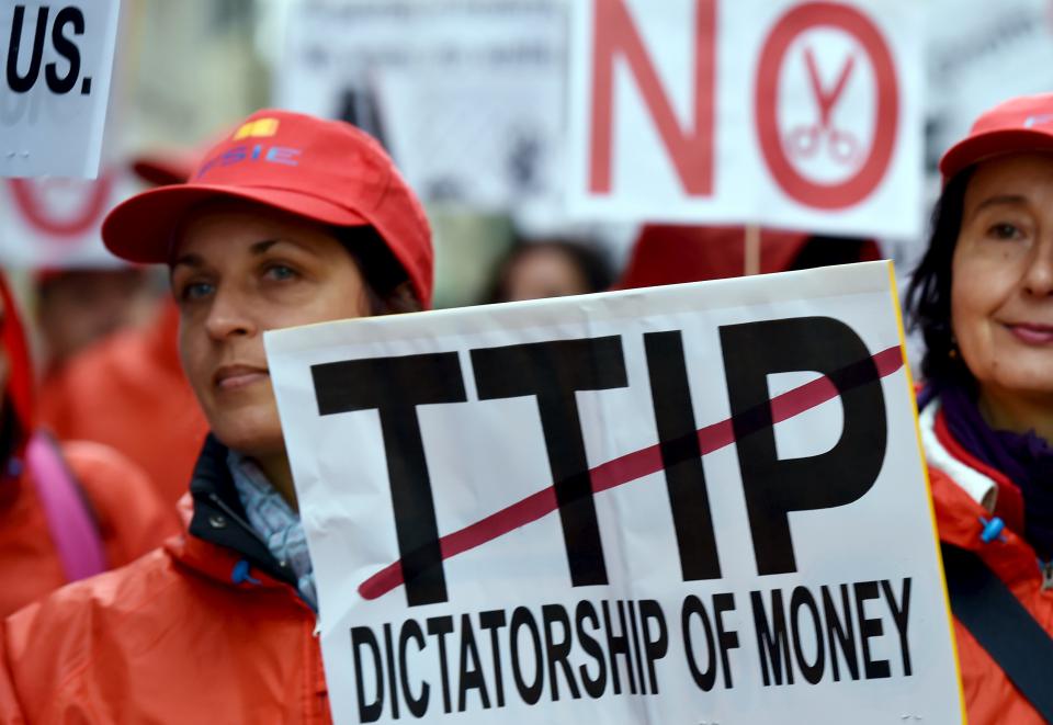 European consumer rights activists take part in a march to protest against the Transatlantic Trade and Investment Partnership (TTIP), austerity and poverty in Brussels, Belgium October 17, 2015. REUTERS/Eric Vidal