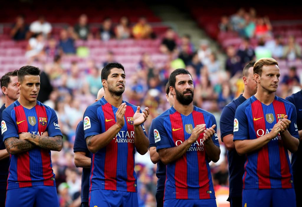 Cristian Tello, Luis Suarez, Arda Turan and Ivan Rakitic during the presentation of the Barcelona team 2016-17, held in the Camp Nou stadium, on august 10, 2016. (Photo by Urbanandsport/NurPhoto)