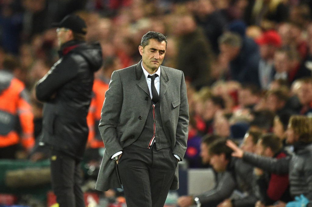 (FILES) In this file photo taken on May 07, 2019 Barcelona&amp;#39;s Spanish coach Ernesto Valverde reacts during the UEFA Champions league semi-final second leg football match between Liverpool and Barcelona at Anfield in Liverpool, north west England on May 7, 2019. - Barcelona are set to sack their coach Ernesto Valverde, according to reports in the Spanish press. Valverde took training on January 13, 2020 but his future looks bleak, with the club expected to announce his departure following a board meeting in the afternoon at Camp Nou. (Photo by Oli SCARFF/AFP)