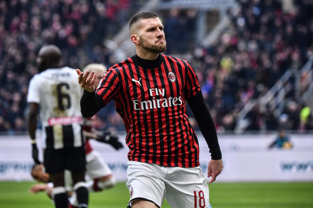 AC Milan&amp;#39;s Croatian forward Ante Rebic celebrates after scoring an equalizer during the Italian Serie A football match AC Milan vs Udinese on January 19, 2020 at the San Siro stadium in Milan. (Photo by Marco Bertorello/AFP)