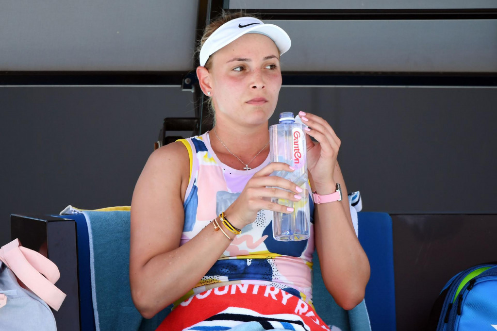Croatia&amp;#39;s Donna Vekic sits between games during her women&amp;#39;s singles match against Poland&amp;#39;s Iga Swiatek on day six of the Australian Open tennis tournament in Melbourne on January 25, 2020. (Photo by John DONEGAN/AFP)/IMAGE RESTRICTED TO EDITORIAL USE - STRICTLY NO COMMERCIAL USE