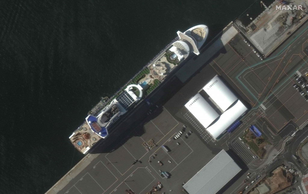 This handout image collected by Maxar�s WorldView-2 satellite on February 6, 2020 shows the quarantined Diamond Princess cruise ship at Daikoku Pier Cruise Terminal in Yokohama. - At least 61 people on board a cruise ship off Japan have tested positive for the new coronavirus, the government said February 7, as thousands of passengers and crew face a two-week quarantine. (Photo by -/Satellite image Š2020 Maxar Technologies/AFP)/RESTRICTED TO EDITORIAL USE - MANDATORY CREDIT ”AFP PHOTO/Satellite image Š2020 Maxar Technologies ” - NO MARKETING - NO ADVERTISING CAMPAIGNS - DISTRIBUTED AS A SERVICE TO CLIENTS