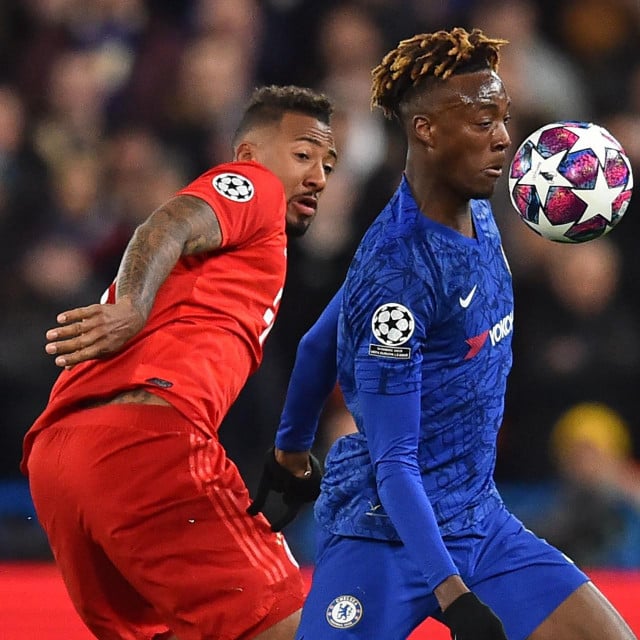 Chelsea&amp;#39;s English striker Tammy Abraham (R) vies with Bayern Munich&amp;#39;s German defender Jerome Boateng during the UEFA Champion&amp;#39;s League round of 16 first leg football match between Chelsea and Bayern Munich at Stamford Bridge in London on February 25, 2020. (Photo by Glyn KIRK/AFP)