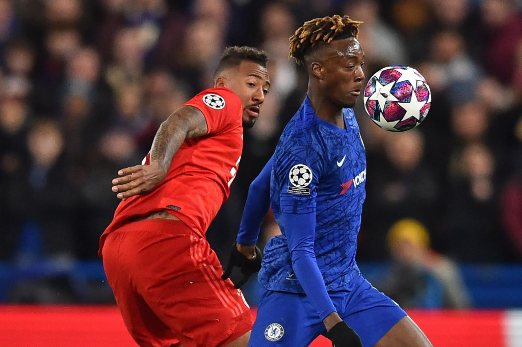 Chelsea&amp;#39;s English striker Tammy Abraham (R) vies with Bayern Munich&amp;#39;s German defender Jerome Boateng during the UEFA Champion&amp;#39;s League round of 16 first leg football match between Chelsea and Bayern Munich at Stamford Bridge in London on February 25, 2020. (Photo by Glyn KIRK/AFP)