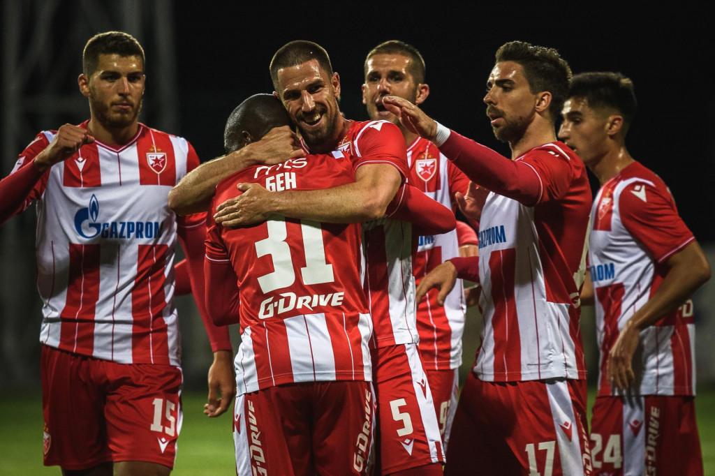 Red Star&amp;#39;s Milos Degenek celebrates with his team mates after scoring a goal during the football match between FC Rad and FC Crvena Zvezda (FC Red Star) at the ”King Petar I” stadium in Belgrade on May 29, 2020, as Serbia&amp;#39;s first and second division resumed today behind closed doors, after it was stoped due to the COVID-19 pandemic in mid-March. (Photo by Andrej ISAKOVIC/AFP)