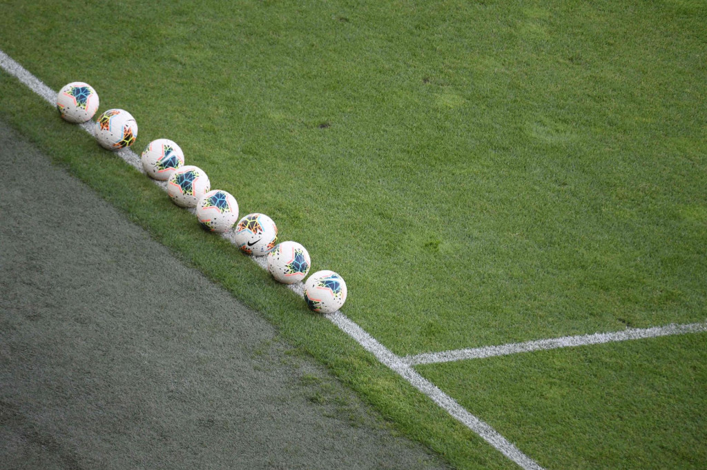 Footballs are ready on the sideline for the start of the national championship&amp;#39;s football match between DVTK and Mezokovesd in the DVTK stadium in Miskolc town, Hungary, on May 30, 2020. - Hungarian spectators will find from this weekend, in a restricted audience, the stands of the country&amp;#39;s football stadiums - a first in Europe where the resumption of several national championships was done behind closed doors. (Photo by Attila KISBENEDEK/AFP)