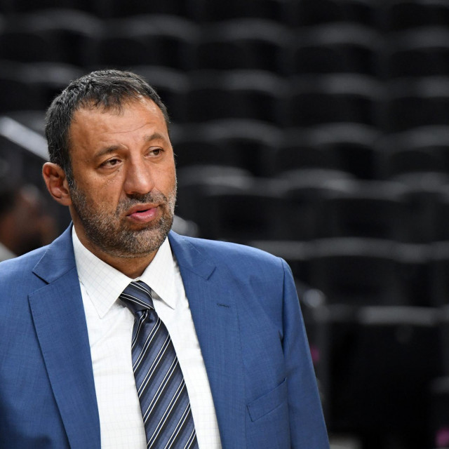 (FILES) In this file photo taken on October 8, 2017 Vice president of basketball operations and general manager of the Sacramento Kings Vlade Divac watches warmups before the team&amp;#39;s preseason game against the Los Angeles Lakers at T-Mobile Arena in Las Vegas, Nevada. - Vlade Divac stepped down as general manager of the NBA&amp;#39;s Sacramento Kings on August 14, 2020 and Joe Dumars, another ex-player, was named to take his duties on an interim basis. (Photo by Ethan Miller/GETTY IMAGES NORTH AMERICA/AFP)