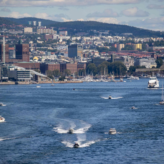 Boats and ferries are seen on in the Oslo fjord along the waterfront of the Norwegian capital on July 25, 2020. (Photo by Odd ANDERSEN/AFP)