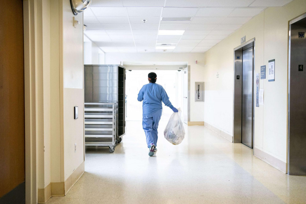 SEATTLE, WA - AUGUST 20: Aster Mekonen carries a trash bag during her cleaning shift at Harborview Medical Center on August 20, 2020 in Seattle, Washington. Mekonen, a member of the hospitals environmental services department, is trained in coronavirus (COVID-19) protocols and can work in both standard and COVID-19 areas. David Ryder/Getty Images/AFP&lt;br /&gt;
== FOR NEWSPAPERS, INTERNET, TELCOS &amp; TELEVISION USE ONLY ==