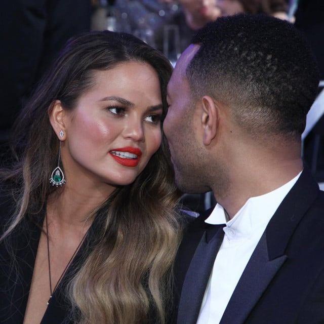 Recording artist John Legend (R) and Chrissy Teigen attend the 23rd Annual Screen Actor Guild Awards at The Shrine Expo Hall on January 29, 2017 in Los Angeles, California. (Photo by Tommaso Boddi/Š2017 SAG-AFTRA/AFP)/Š2017 SAG-AFTRA/AFP/ANGELA WEISS