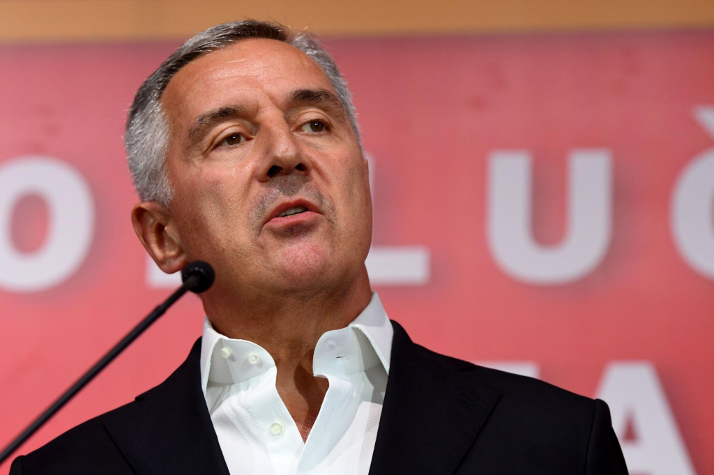 Montenegro&amp;#39;s President Milo Djukanovic, leader of the Democratic Party of Socialists (DPS), addresses the media at his party headquarters after the general election in Podgorica, early on August 31, 2020. - Montenegro&amp;#39;s ruling party was a hair ahead of the main pro-Serb opposition alliance in a hotly-fought election on August 30 that left both sides without a full majority, a preliminary exit poll showed, portending uncertain coalition talks for the Adriatic nation. With little over a third of the vote share, the Democratic Party of Socialists (DPS) led by President Milo Djukanovic -- in power for some three decades -- looked set for its worst electoral showing in history. (Photo by SAVO PRELEVIC/AFP)