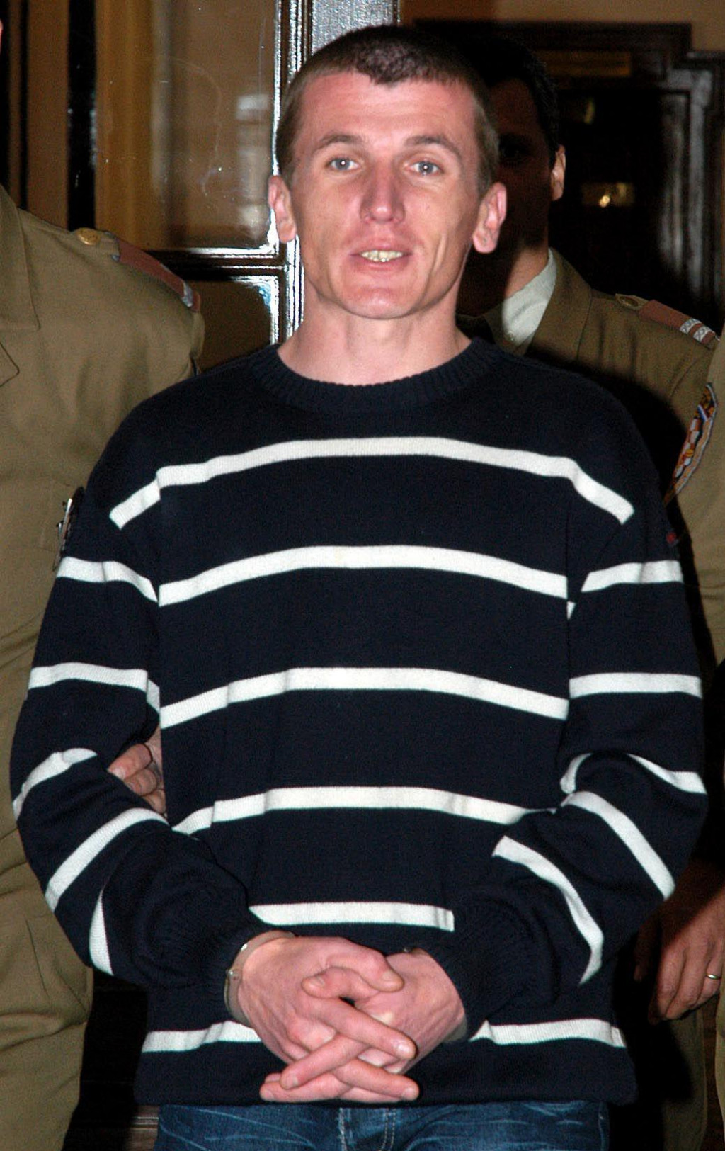 Ćurković pri dovođenju na izricanje presude za ubojstvo 2005.