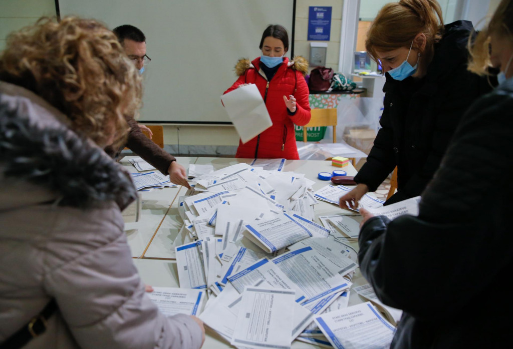 SARAJEVO, BOSNIA AND HERZEGOVINA - NOVEMBER 15: Polling clerks make preparations for counting votes at the end of the voting process of Bosnian local elections, in Sarajevo, Bosnia and Herzegovina on November 15, 2020. 2020 Bosnian municipal elections held with total of 3,283,380 citizens registered to vote on 15 November 2020 to elect mayors and assemblies in municipalities. Mustafa Ozturk/Anadolu Agency