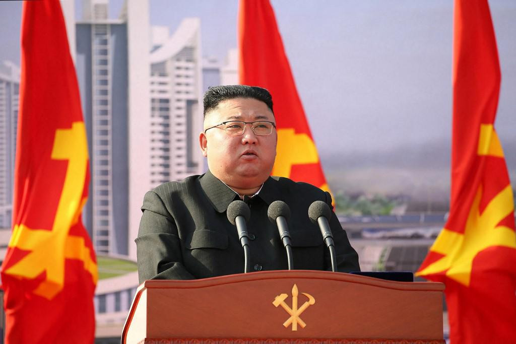 In this picture taken on March 23, 2021 and released from North Korea&amp;#39;s official Korean Central News Agency (KCNA) on March 24, 2021 North Korean leader Kim Jong Un speaks during the ground-breaking ceremony of a construction project for building 10000 apartments in Pyongyang. (Photo by STR/KCNA VIA KNS/AFP)/South Korea OUT/---EDITORS NOTE--- RESTRICTED TO EDITORIAL USE - MANDATORY CREDIT ”AFP PHOTO/KCNA VIA KNS” - NO MARKETING NO ADVERTISING CAMPAIGNS - DISTRIBUTED AS A SERVICE TO CLIENTS/THIS PICTURE WAS MADE AVAILABLE BY A THIRD PARTY. AFP CAN NOT INDEPENDENTLY VERIFY THE AUTHENTICITY, LOCATION, DATE AND CONTENT OF THIS IMAGE ---/