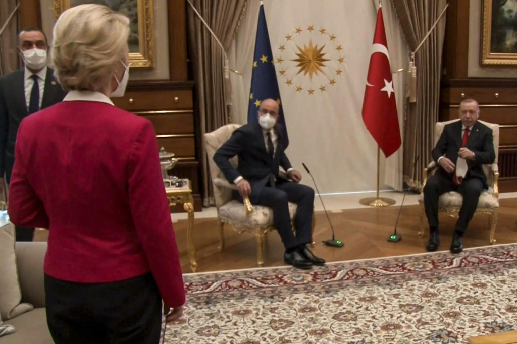 TOPSHOT - This video frame grab taken from footage released by The Turkish Presidency on April 6, 2021, shows Turkish President Recep Tayyip Erdogan (R) receiving EU Council President Charles Michel (C) and President of EU Commission Ursula von der Leyen (L) at the Presidential Complex in Ankara. - The European Commission hit out April 7, 2021, at a diplomatic snub that left its head Ursula von der Leyen without a chair as male counterparts sat down at a meeting with Turkish President Recep Tayyip Erdogan. Video from the April 6, 2021, encounter in Ankara showed von der Leyen flummoxed as the Turkish leader and European Council president Charles Michel took the only two chairs in front of their flags. (Photo by -/various sources/AFP)/RESTRICTED TO EDITORIAL USE - MANDATORY CREDIT ”AFP PHOTO /TURKISH PRESIDENTIAL PRESS SERVICE ” - NO MARKETING - NO ADVERTISING CAMPAIGNS - DISTRIBUTED AS A SERVICE TO CLIENTS