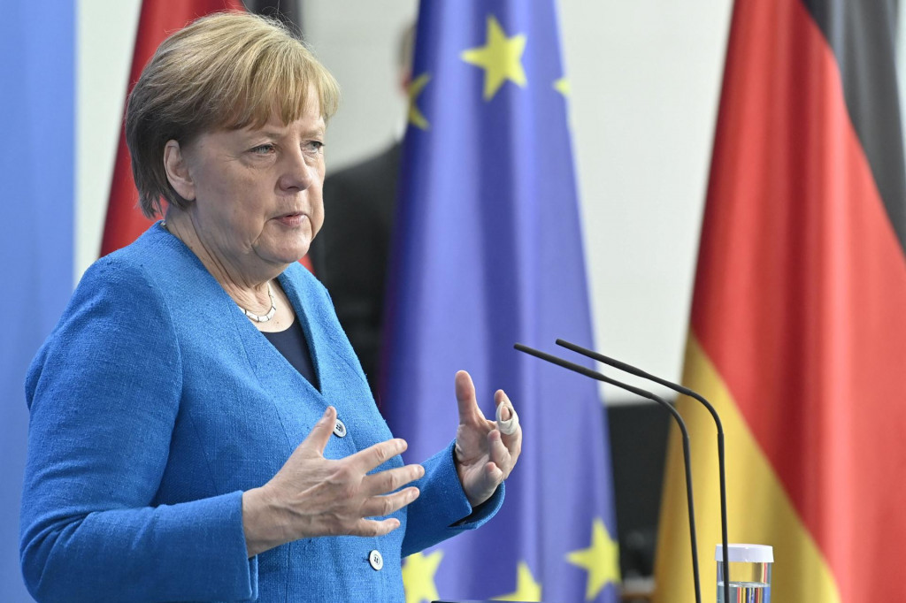 German Chancellor Angela Merkel attends a press conference after the informal EU summit and the EU-China summit in Berlin, on May 8, 2021. (Photo by John MACDOUGALL/POOL/AFP)