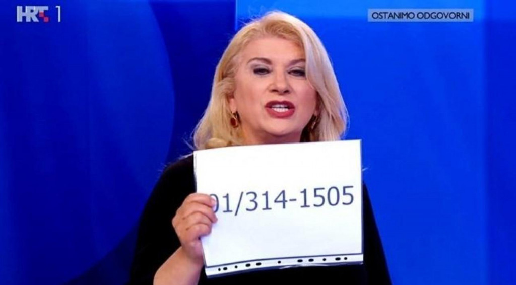Vesna Škare Ožbolt pokazuje broj s kojeg su stizali perfidni pozivi