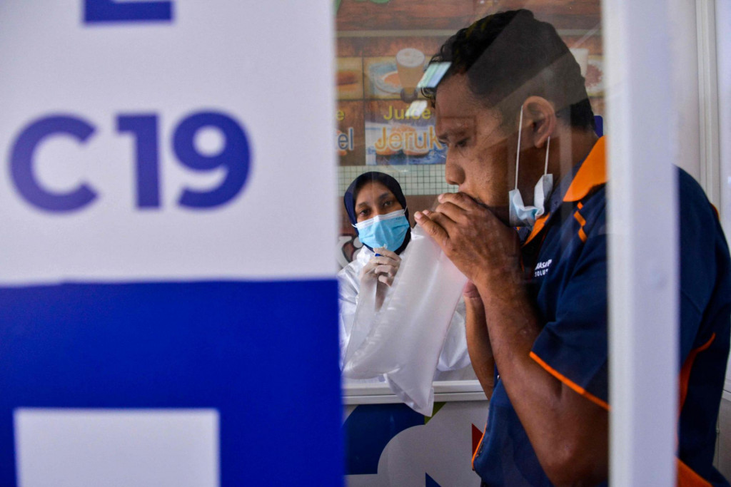 (Photo by CHAIDEER MAHYUDDIN/AFP)