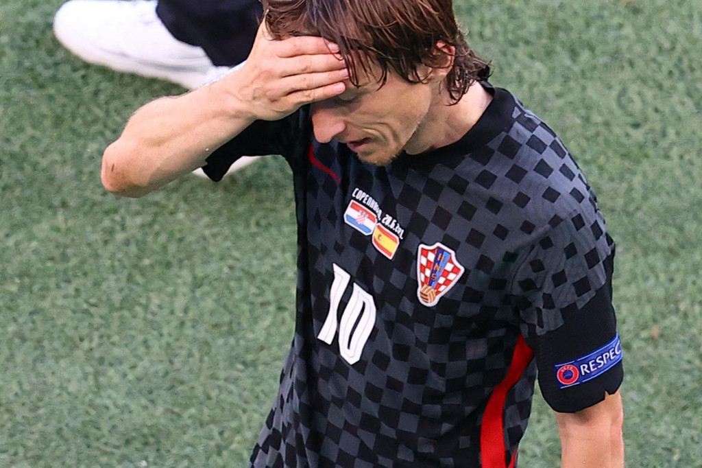 Croatia&amp;#39;s midfielder Luka Modric gestures as he walks off the pitch during the UEFA EURO 2020 round of 16 football match between Croatia and Spain at the Parken Stadium in Copenhagen on June 28, 2021. (Photo by WOLFGANG RATTAY/POOL/AFP)