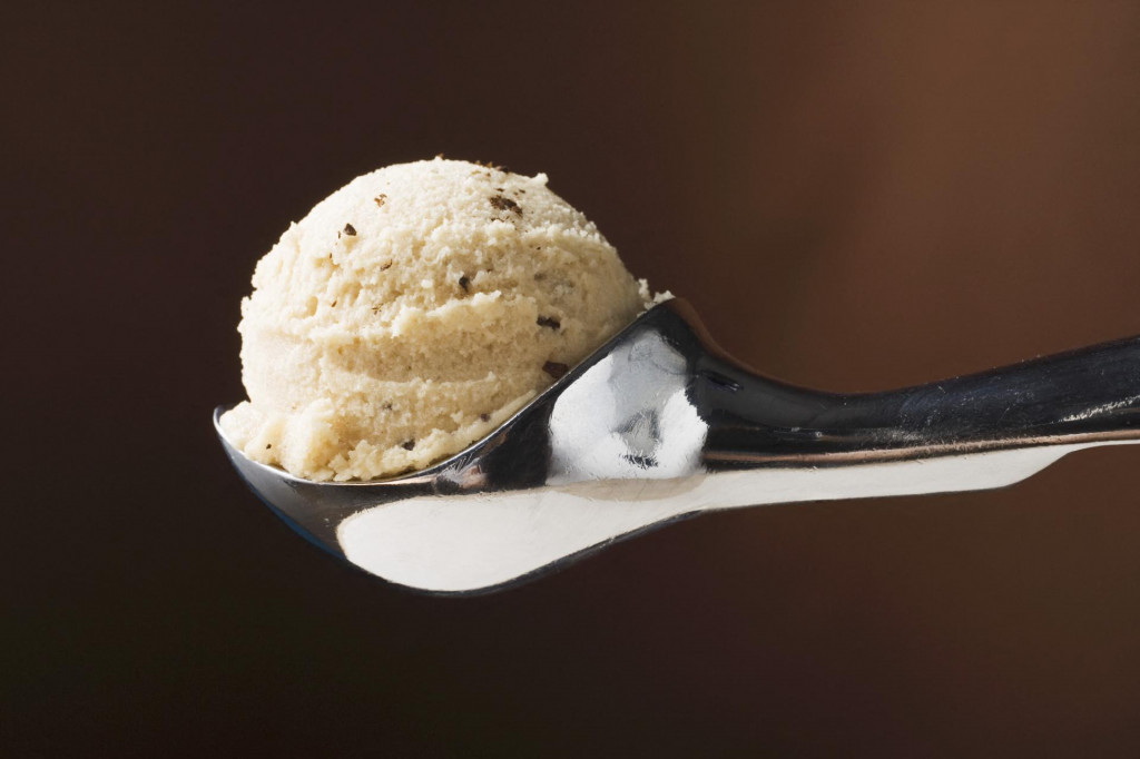 Scoop of ice cream in ice cream scoop (Photo by Foodcollection GesmbH/foodcollection/foodcollection via AFP)