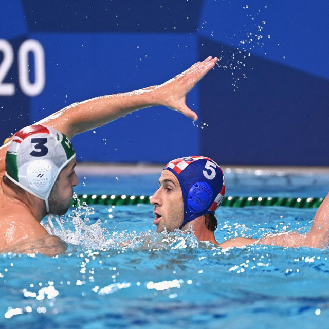 Hungary&amp;#39;s Krisztian Manhercz (L) challenges Croatia&amp;#39;s Maro Jokovic during the Tokyo 2020 Olympic Games men&amp;#39;s water polo quarter-final match between Hungary and Croatia at the Tatsumi Water Polo Centre in Tokyo on August 4, 2021. (Photo by Angela Weiss/AFP)