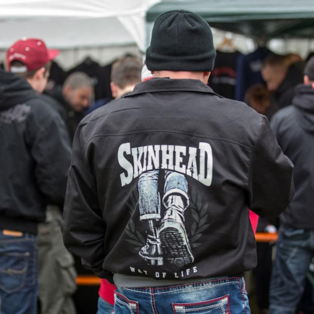 Supporters of the right-wing scene at an open-air Rechtsrock (right-wing rock) concert in Themar, Germany, 28 October 2017. Photo: Arifoto Ug/Michael Reichel/dpa-Zentralbild/ZB (Photo by arifoto UG/ZB/dpa Picture-Alliance via AFP)