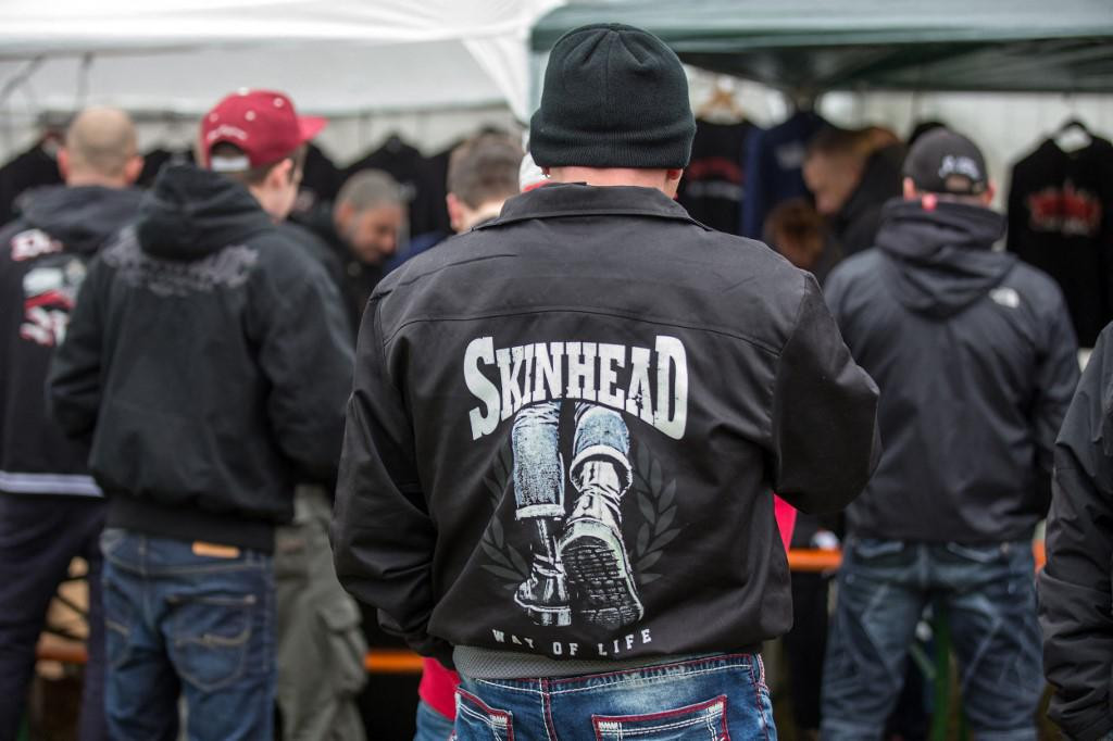 Supporters of the right-wing scene at an open-air Rechtsrock (right-wing rock) concert in Themar, Germany, 28 October 2017. Photo: Arifoto Ug/Michael Reichel/dpa-Zentralbild/ZB (Photo by arifoto UG/ZB/dpa Picture-Alliance via AFP)
