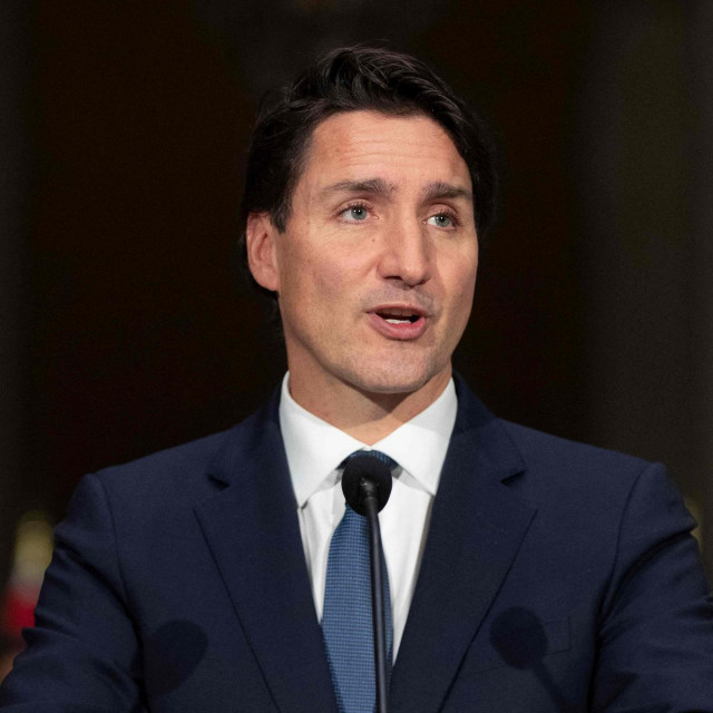 Canadian Prime Minister Justin Trudeau speaks during a press conference with members of his new cabinet in Ottawa, Canada, on October 26, 2021. (Photo by Lars Hagberg/AFP)