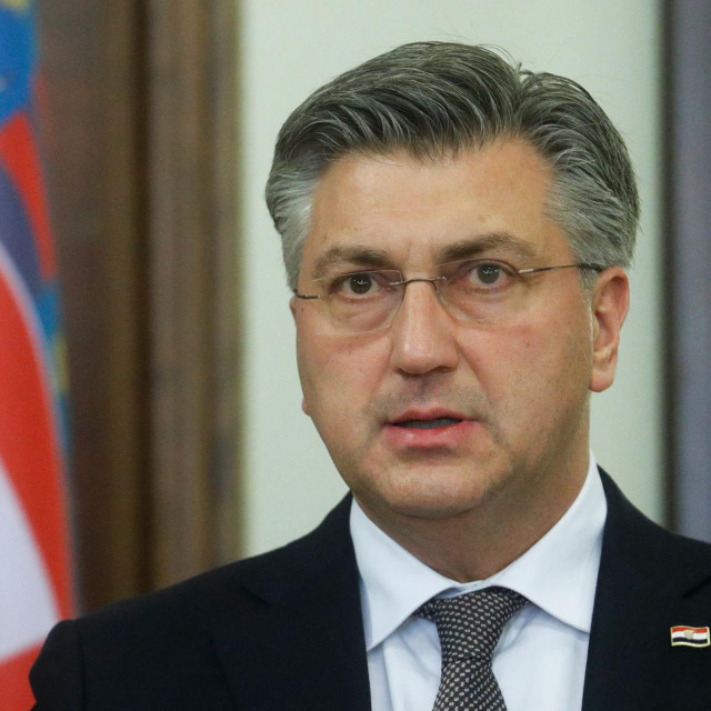 Croatian Prime Minister Andrej Plenkovic speaks during a joint statement with Ukrainian President Volodymyr Zelensky (not seen) in Kiev on December 8, 2021. (Photo by VALENTYN OGIRENKO/POOL/AFP)