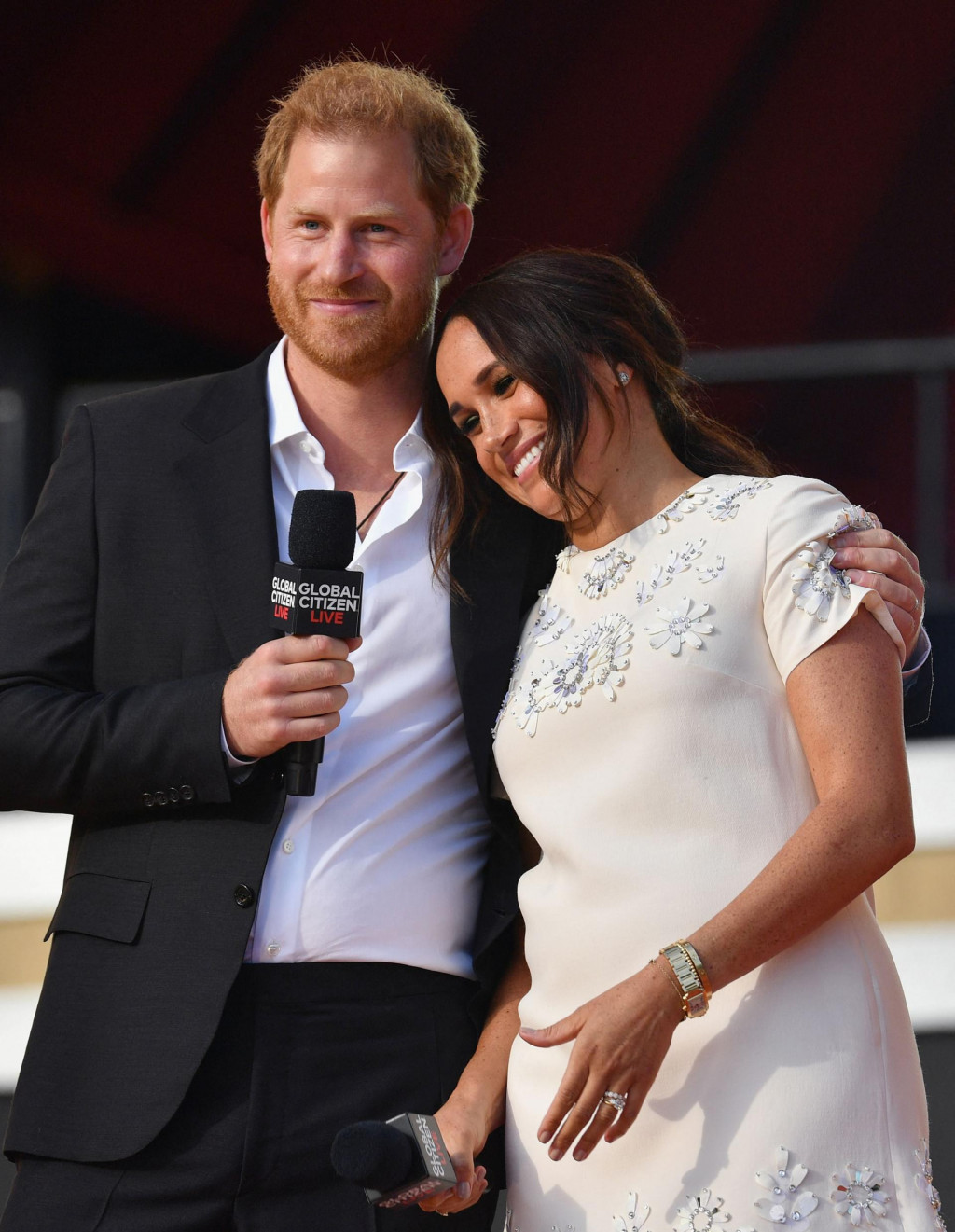 (FILES) In this file photo taken on September 25, 2021 Britain&amp;#39;s Prince Harry and Meghan Markle speak during the 2021 Global Citizen Live festival at the Great Lawn, Central Park in New York City. - Britain&amp;#39;s Prince Harry and his wife Meghan Markle have forged another business partnership on October 12, 2021-- this time in the world of finance, teaming up with an asset management company promoting socially responsible investments. (Photo by Angela Weiss/AFP)