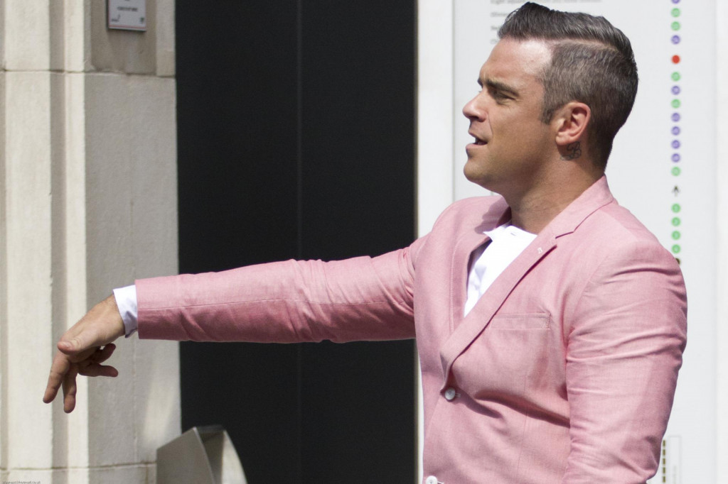 Ekstremna slava i izuzetan uspjeh isprepleteni su s tjeskobom, depresijom i mentalnom bolešću, kaže Robbie Williams