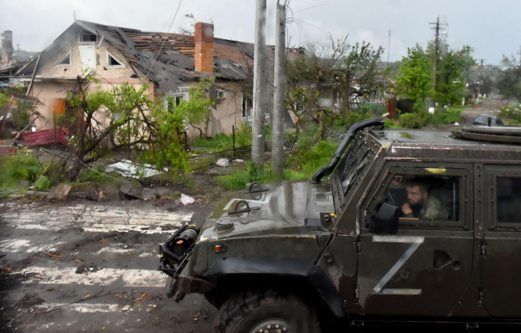 &lt;p&gt;TOPSHOT - A Russian military vehicle painted with the letter Z drives past destroyed houses in Ukraine&amp;#39;s port city of Mariupol on May 18, 2022, amid the ongoing Russian military action in Ukraine. (Photo by Olga MALTSEVA/AFP)&lt;/p&gt;