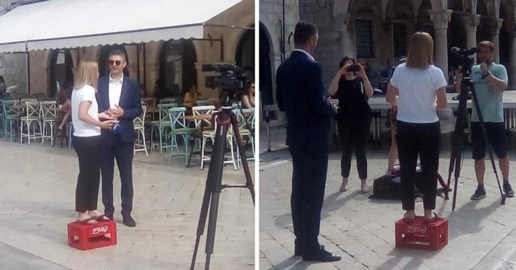 &lt;p&gt;Novinarka N1 televizije stoji na gajbi piva tijekom razgovora s gradonačelnikom Dubrovnika&lt;/p&gt;