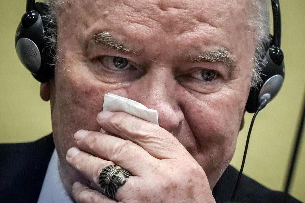 &lt;p&gt;Ex-Bosnian Serb military chief Ratko Mladic wipes his face as he sits in the defendant box during the earing of the final verdict on appeal against his genocide conviction over the 1995 Srebrenica massacre, Europe‘s worst act of bloodshed since World War II, on June 8, 2021 at the International Residual Mechanism for Criminal Tribunals (IRMCT) in The Hague. (Photo by Peter Dejong/POOL/AFP)&lt;/p&gt;