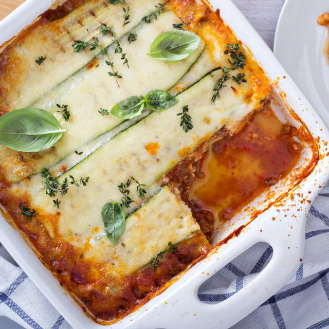 &lt;p&gt;Healthy zucchini lasagna bolognese in a baking dish&lt;/p&gt;