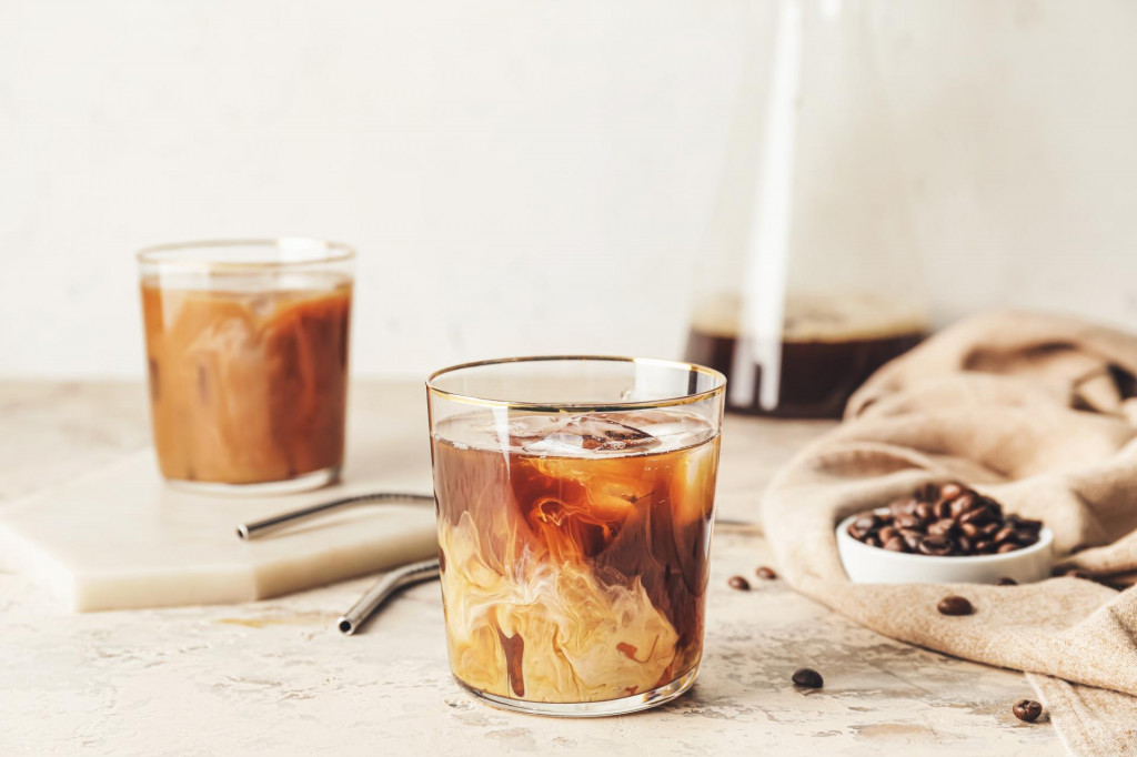 &lt;p&gt;Delicious cold brew coffee with milk in glass on grunge table&lt;/p&gt;