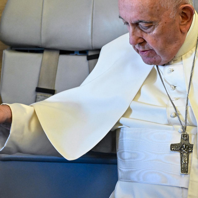 &lt;p&gt;Pope Francis arrives to address journalists aboard the plane flying from Nur-Sultan to Rome following his three-day visit to Kazakhstan on September 15, 2022. (Photo by Alessandro DI MEO/POOL/AFP)&lt;/p&gt;