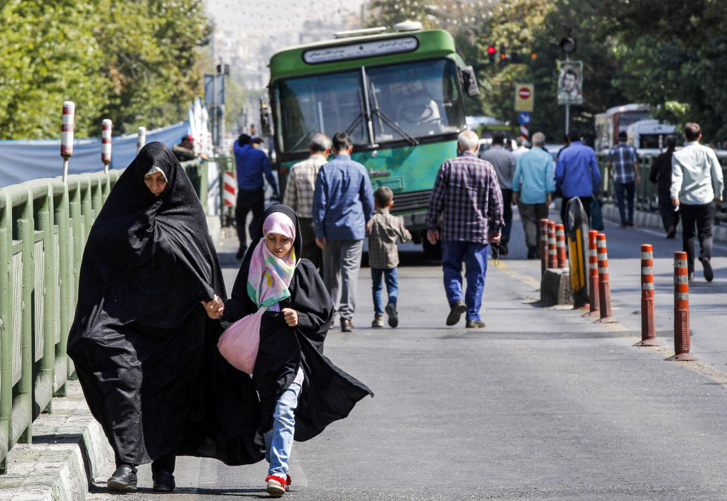 &lt;p&gt;A woman and a girl walk on their way for the weekly Muslim Friday prayers in Iran‘s capital Tehran on September 30, 2022. (Photo by AFP)&lt;/p&gt;