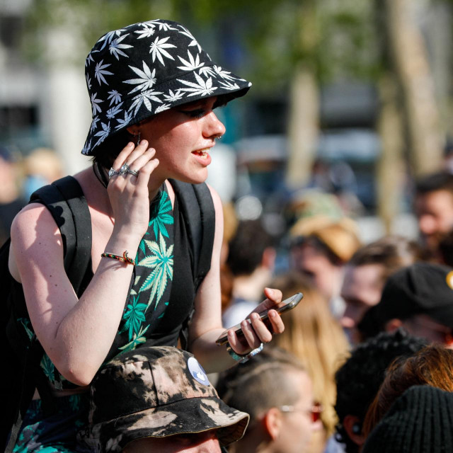 &lt;p&gt;A woman, wearing clothes bearing cannabis leaves, takes part in the ”CannaParade”, a demonstration in favour of the legalisation of cannabis use in Paris on May 29, 2021. (Photo by GEOFFROY VAN DER HASSELT/AFP)&lt;/p&gt;