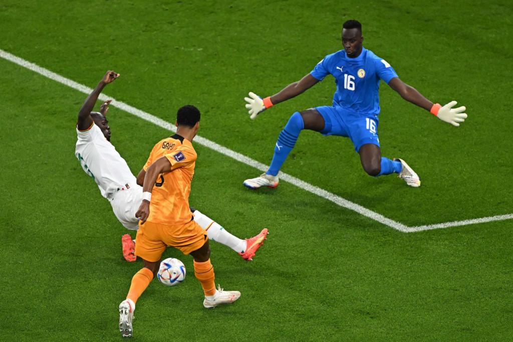 &lt;p&gt;Senegal‘s defender #03 Kalidou Koulibaly (C) fights for the ball with Netherlands‘ forward #08 Cody Gakpo (C) as Senegal‘s goalkeeper #01 Edouard Mendy during the Qatar 2022 World Cup Group A football match between Senegal and the Netherlands at the Al-Thumama Stadium in Doha on November 21, 2022. (Photo by MANAN VATSYAYANA/AFP)&lt;/p&gt;