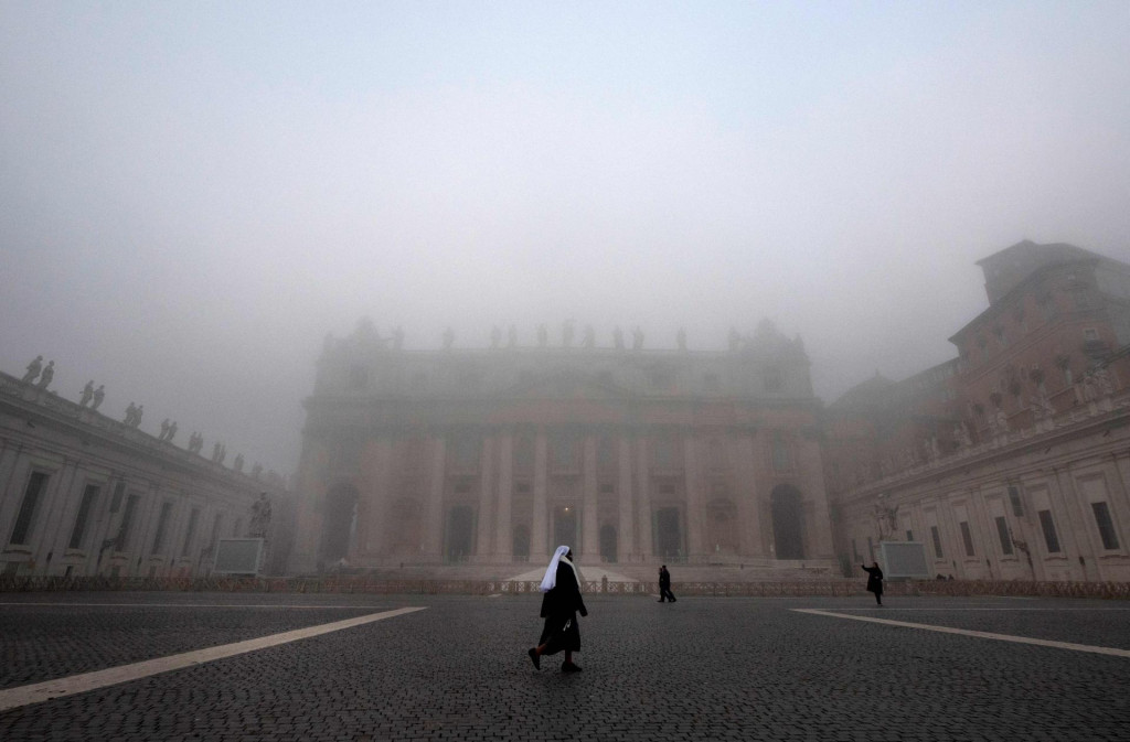&lt;p&gt;A nun walks amid fog over Saint Peter‘s square prior to Pope Francis‘ mass in St. Peter‘s Basilica at the Vatican on January 1, 2022. (Photo by Tiziana FABI/AFP)&lt;/p&gt;