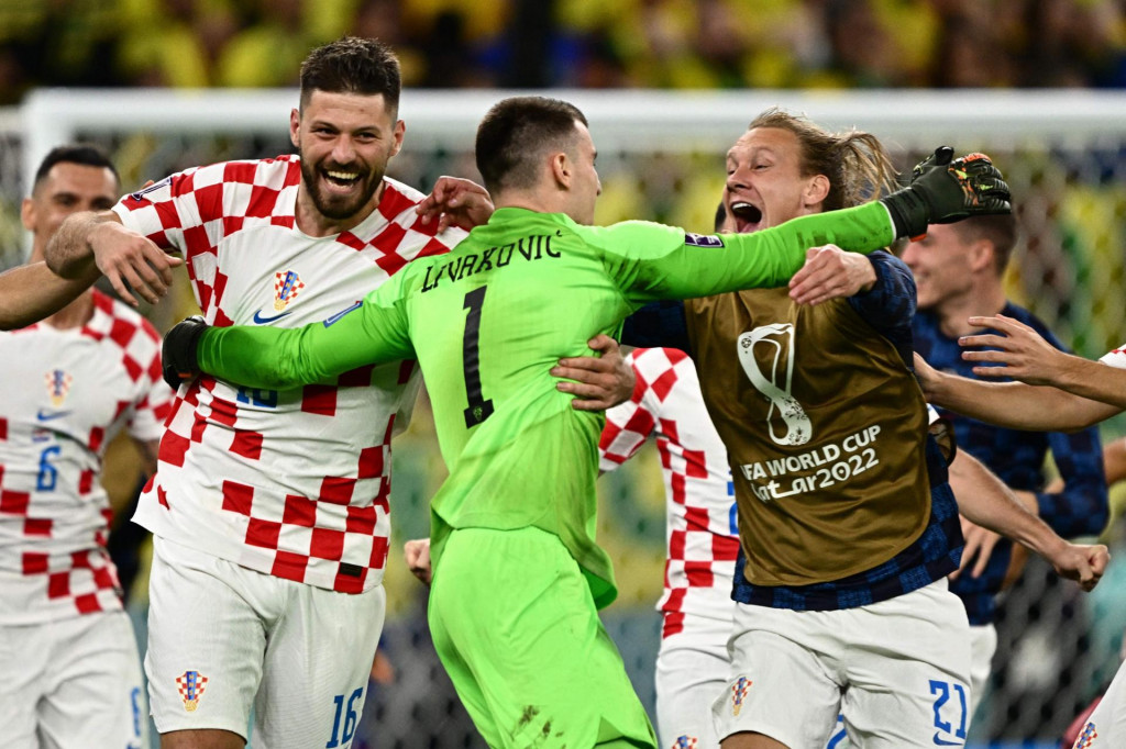 &lt;p&gt;Croatia‘s forward #16 Bruno Petkovic, Croatia‘s goalkeeper #01 Dominik Livakovic and Croatia‘s defender #21 Domagoj Vida celebrate after qualifying to the next round after defeating Brazil in the penalty shoot-out of the Qatar 2022 World Cup quarter-final football match between Croatia and Brazil at Education City Stadium in Al-Rayyan, west of Doha, on December 9, 2022. (Photo by GABRIEL BOUYS/AFP)&lt;/p&gt;