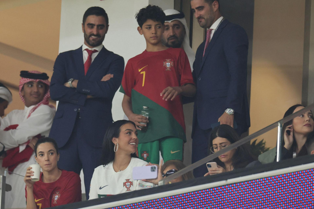 &lt;p&gt;Portugal‘s forward #07 Cristiano Ronaldo‘s partner Georgina Rodriguez (bottom) and son Cristiano Ronaldo Jr (C) attend the Qatar 2022 World Cup quarter-final football match between Morocco and Portugal at the Al-Thumama Stadium in Doha on December 10, 2022. (Photo by KARIM JAAFAR/AFP)&lt;/p&gt;