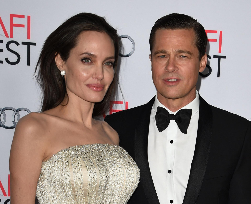 &lt;p&gt;(FILES) In this file photo taken on November 05, 2015 Writer-director-producer-actress Angelina Jolie Pitt (L) and actor-producer Brad Pitt arrive for the opening night gala premiere of Universal Pictures‘ ‘By the Sea‘ during AFI FEST 2015 presented by Audi at the TCL Chinese Theatre in Hollywood, California. - Brad Pitt allegedly hit one of his children in the face and choked another during a fight with Angelina Jolie on a private plane, according to court papers filed October 4, 2022 in the United States by his ex-wife. (Photo by MARK RALSTON/AFP)&lt;/p&gt;