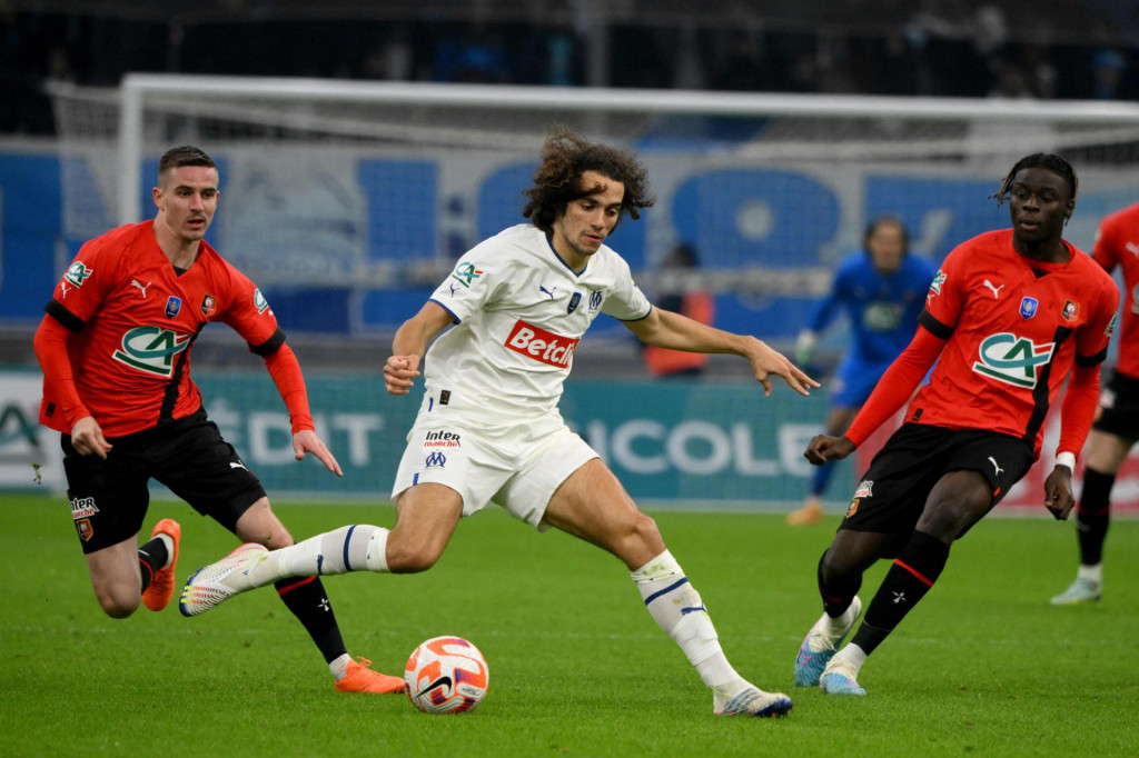 &lt;p&gt;Marseille‘s French midfielder Matteo Guendouzi (C) controls the ball during the French Cup round of 32 football match between Olympique de Marseille (OM) and Stade Rennais FC at the Stade Velodrome in Marseille, southern France on January 20, 2023. (Photo by Nicolas TUCAT/AFP)&lt;/p&gt;