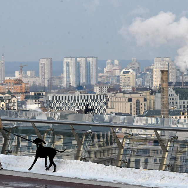 &lt;p&gt;A woman walks a dog after snow fall on January 11, 2023 in Kyiv, amid Russia‘s invasion of Ukraine. (Photo by Sergei SUPINSKY/AFP)&lt;/p&gt;