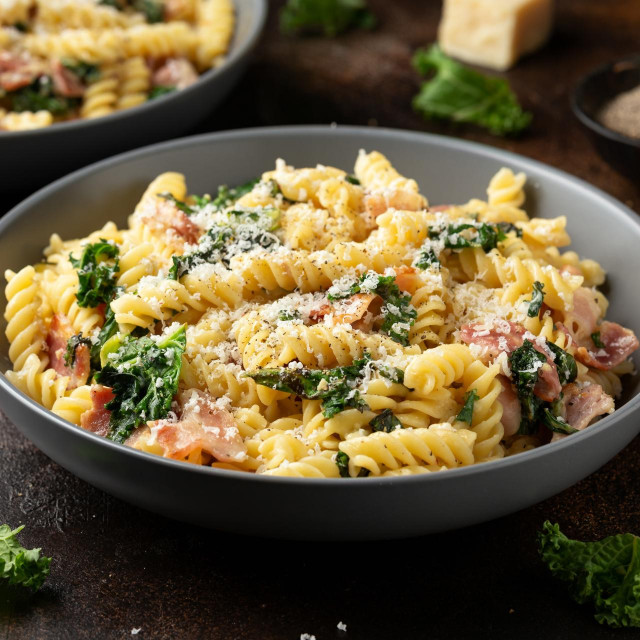 &lt;p&gt;Fusilli pasta with bacon, kale and parmesan cheese. Healthy food&lt;/p&gt;