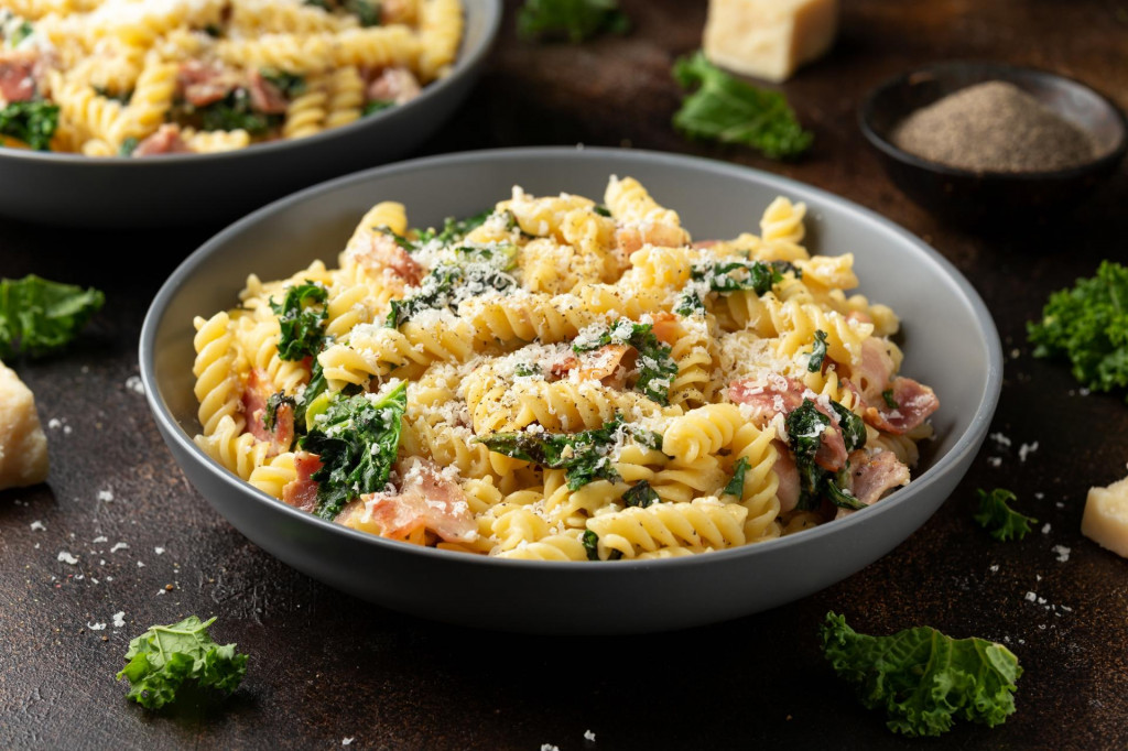 &lt;p&gt;Fusilli pasta with bacon, kale and parmesan cheese. Healthy food&lt;/p&gt;