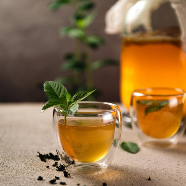 &lt;p&gt;Drink from tea mushrooms, kombucha, homemade, in a jar. Refreshing drink in glass cups with the addition of mint&lt;/p&gt;