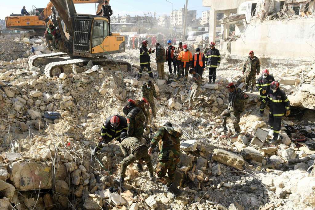 &lt;p&gt;TOPSHOT - Algerian rescue teams take part in the search and rescue operations in Syria‘s northern city of Aleppo on February 8, 2023, two days after a deadly earthquake struck Syria and Turkey. - The death toll from the massive earthquake that struck Turkey and Syria rose above 8,300, official data showed, with rescue workers still searching for trapped survivors. (Photo by AFP)&lt;/p&gt;